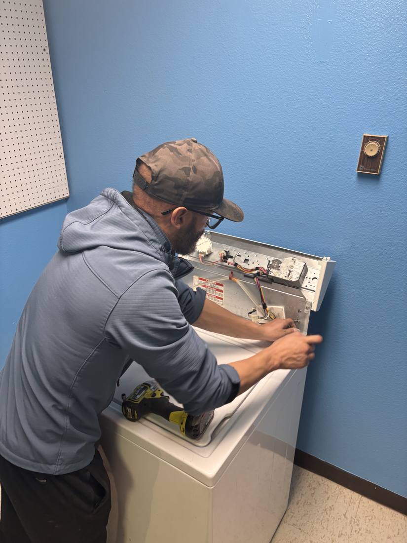Working on a washer's control panel